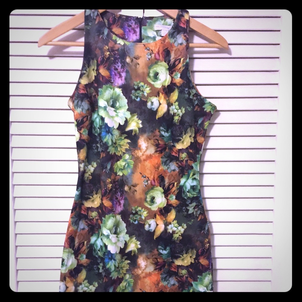 Scuba floral dress with detachable organza skirt.